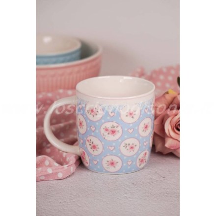 Tazza mug in porcellana, con decoro fiori su sfondo azzurro, firmata Isabelle Rose. Vista frontale